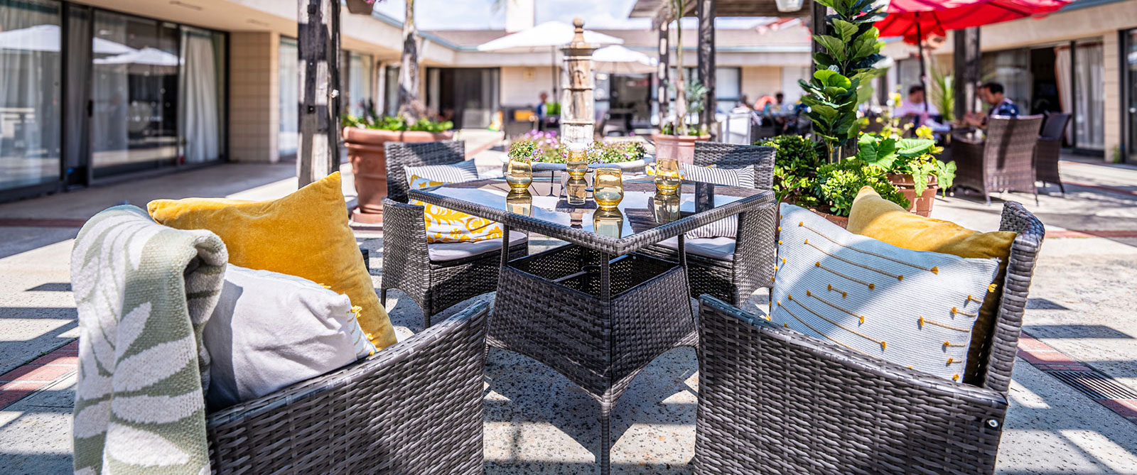 Outdoor seating in courtyard at Alhambra